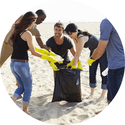 Group cleaning beach
